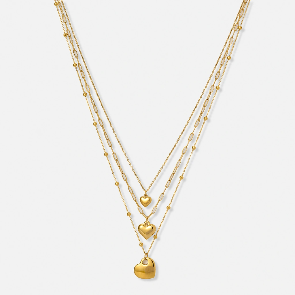 Guldpläterat stålhalsband, tre kedjor med hjärtan - 43-52 cm