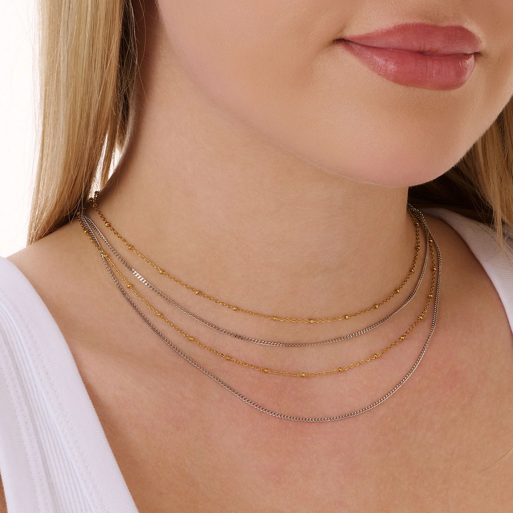 Stålhalsband i bicolor, fyra rader kejdor - 38-45+5cm