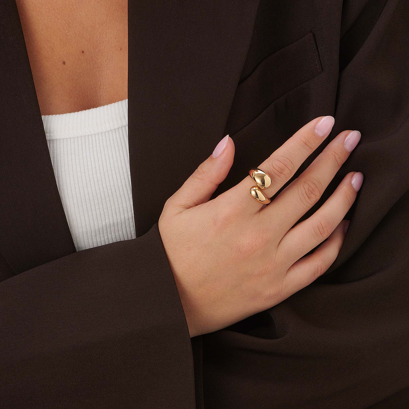 Guldfärgad ring, stor ringlande droppe