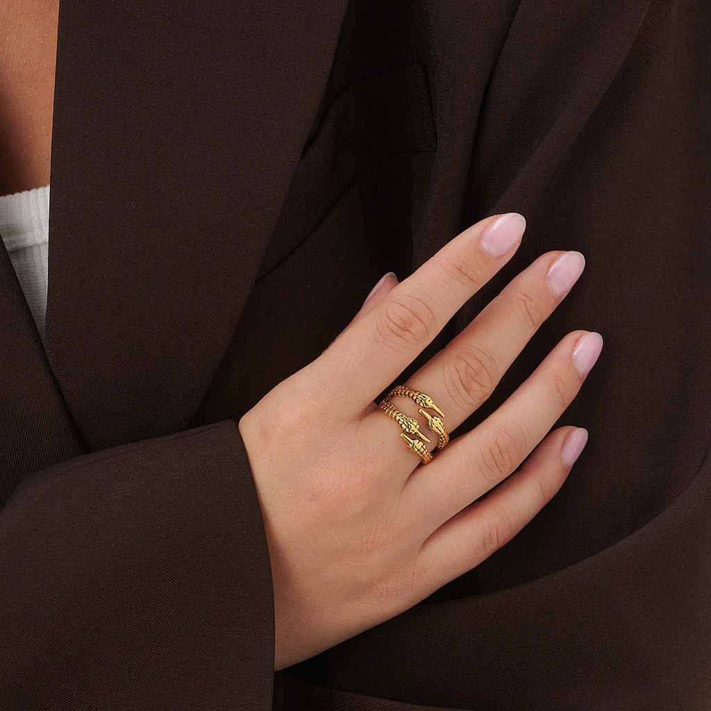 Guldfärgad ring med fågelklo - 18