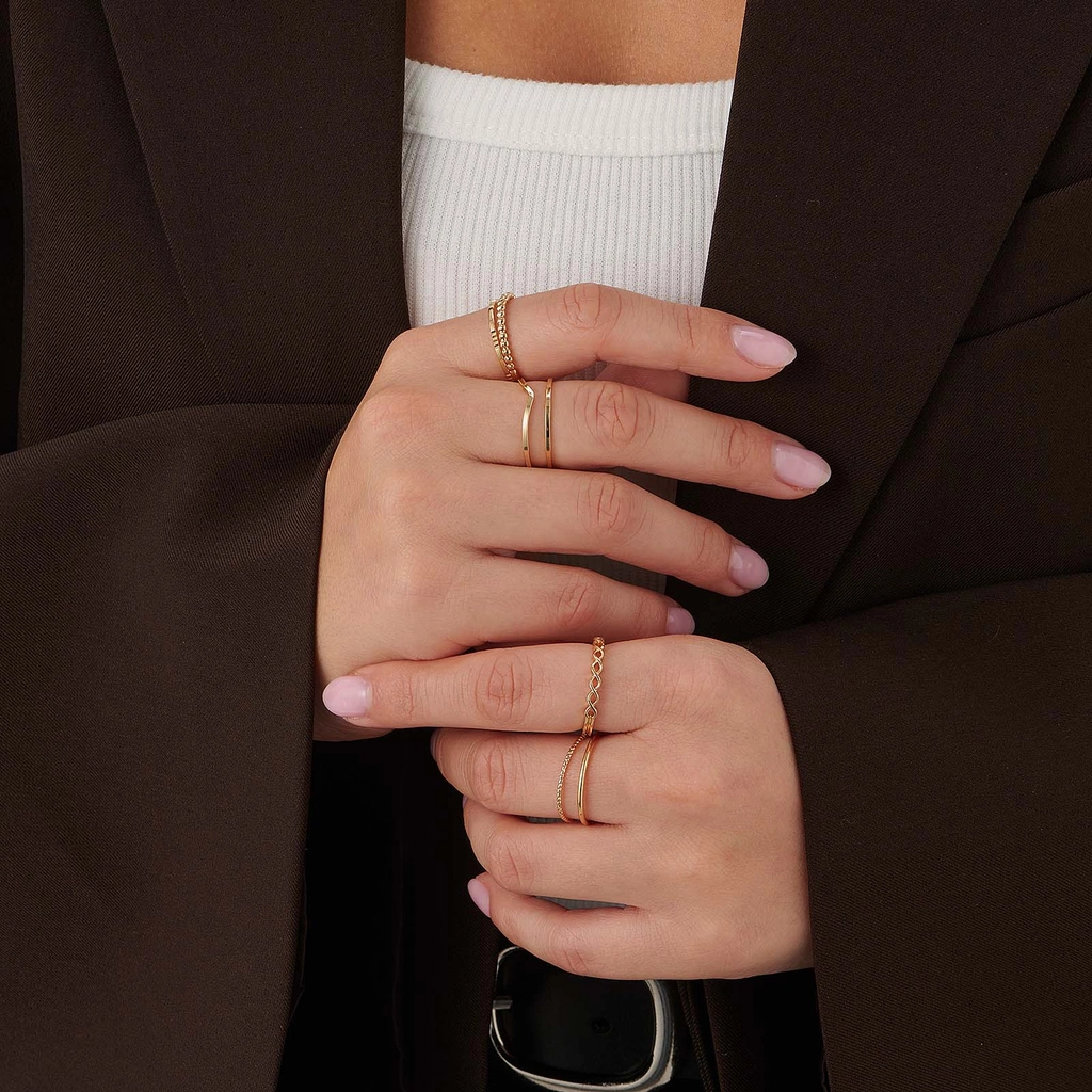 7-pack guldfärgade tunna ringar - 18