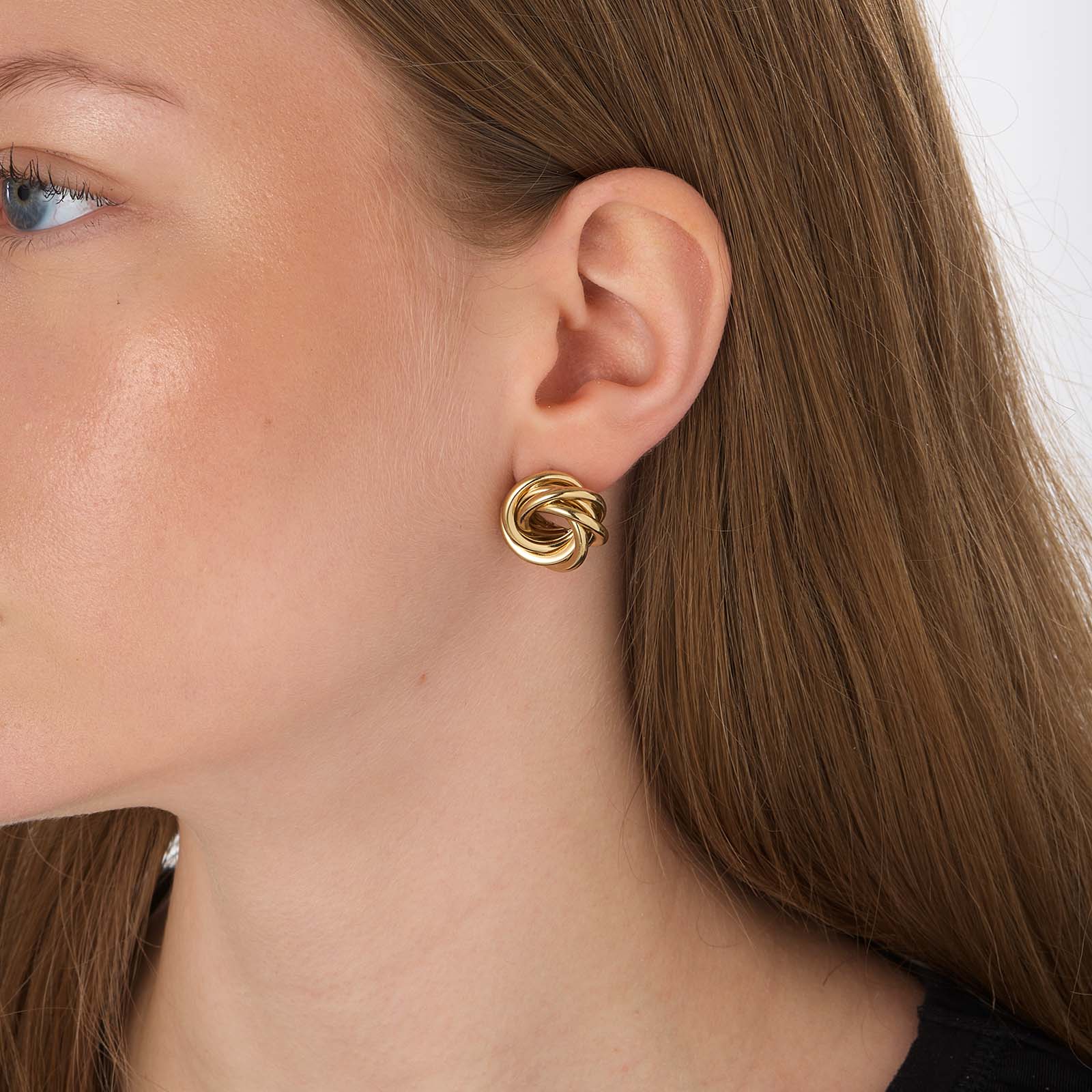 Guldfärgade örhängen, vridna ringar - 20x20mm