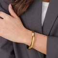 Guldpläterat stålarmband, slät bangle - 8mm bred