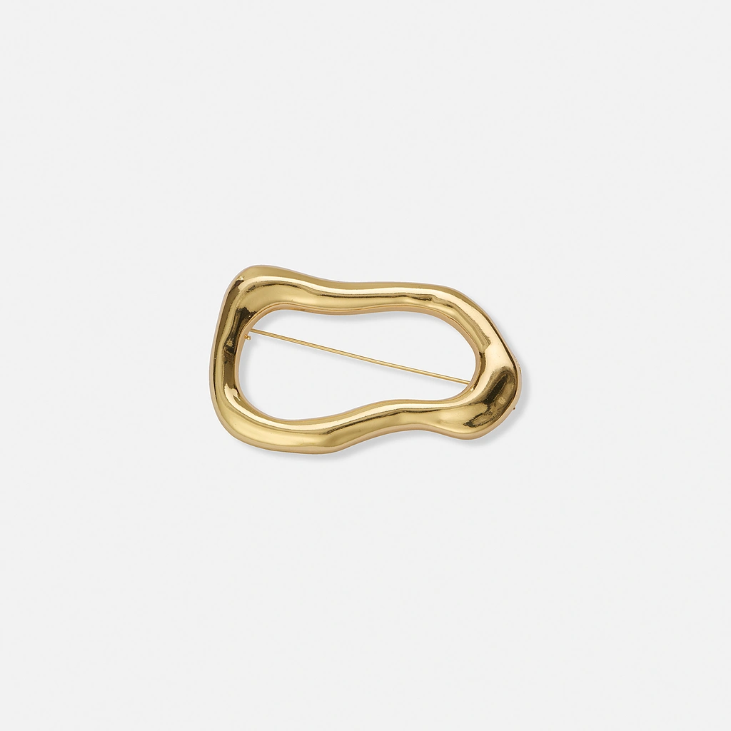 Guldfärgad brosch, ojämn oval form – 6,5 cm