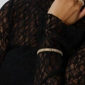 Guldfärgat armband Spike Noir, klara stenar med nitar - Elastiskt