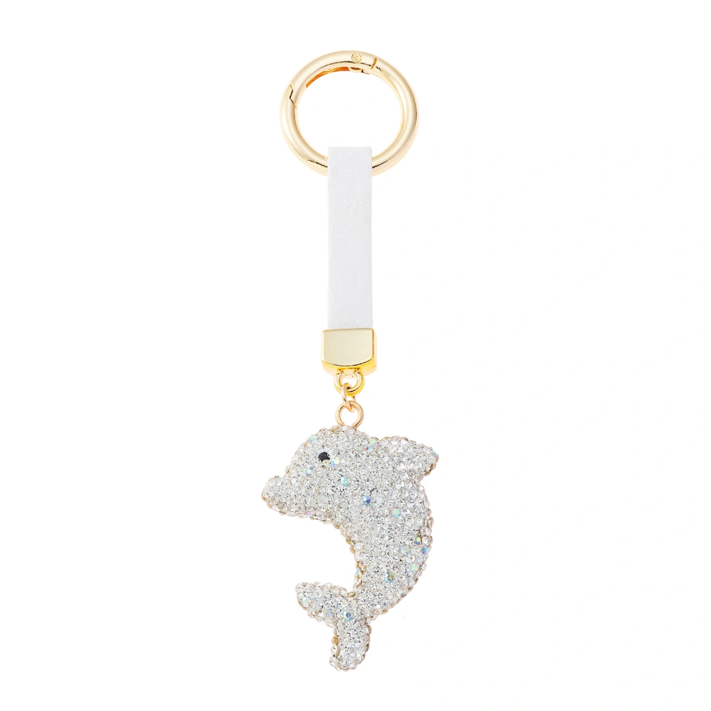 Nyckelring med vit glittrande delfin