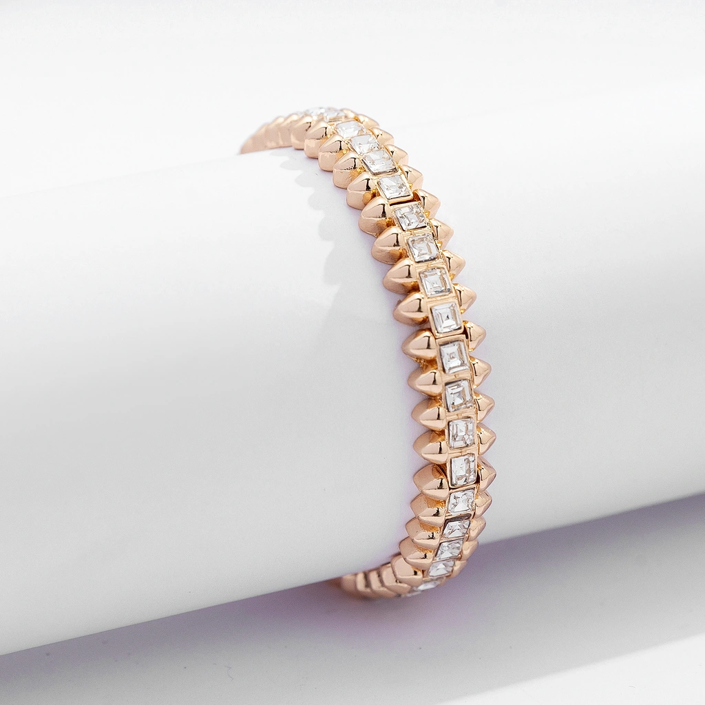 Guldfärgat armband Spike Noir, klara stenar med nitar - Elastiskt