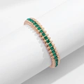 Guldfärgat armband Spike Noir, gröna stenar - Elastiskt