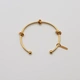 Armband i guldpläterat stål, bangle med knutar - 2,5x66,5 mm