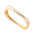 Guldfärgat armband, stelt med vågig form - 7x6 cm
